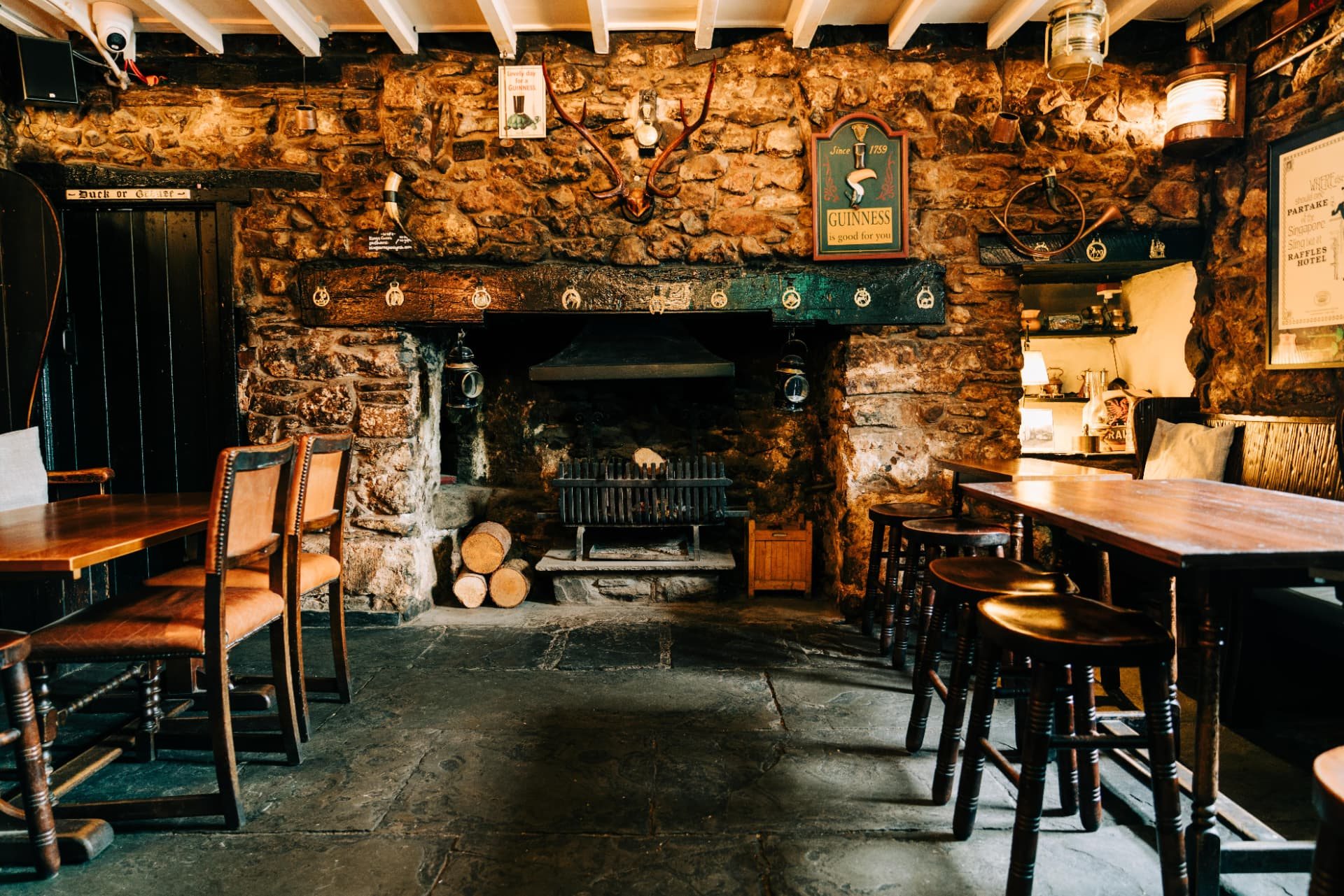 The stone fireplace in The Snug