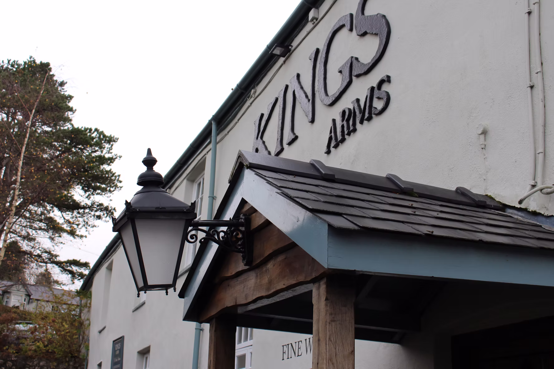 The front of The Kings Arms Pentyrch with the lantern and pub sign