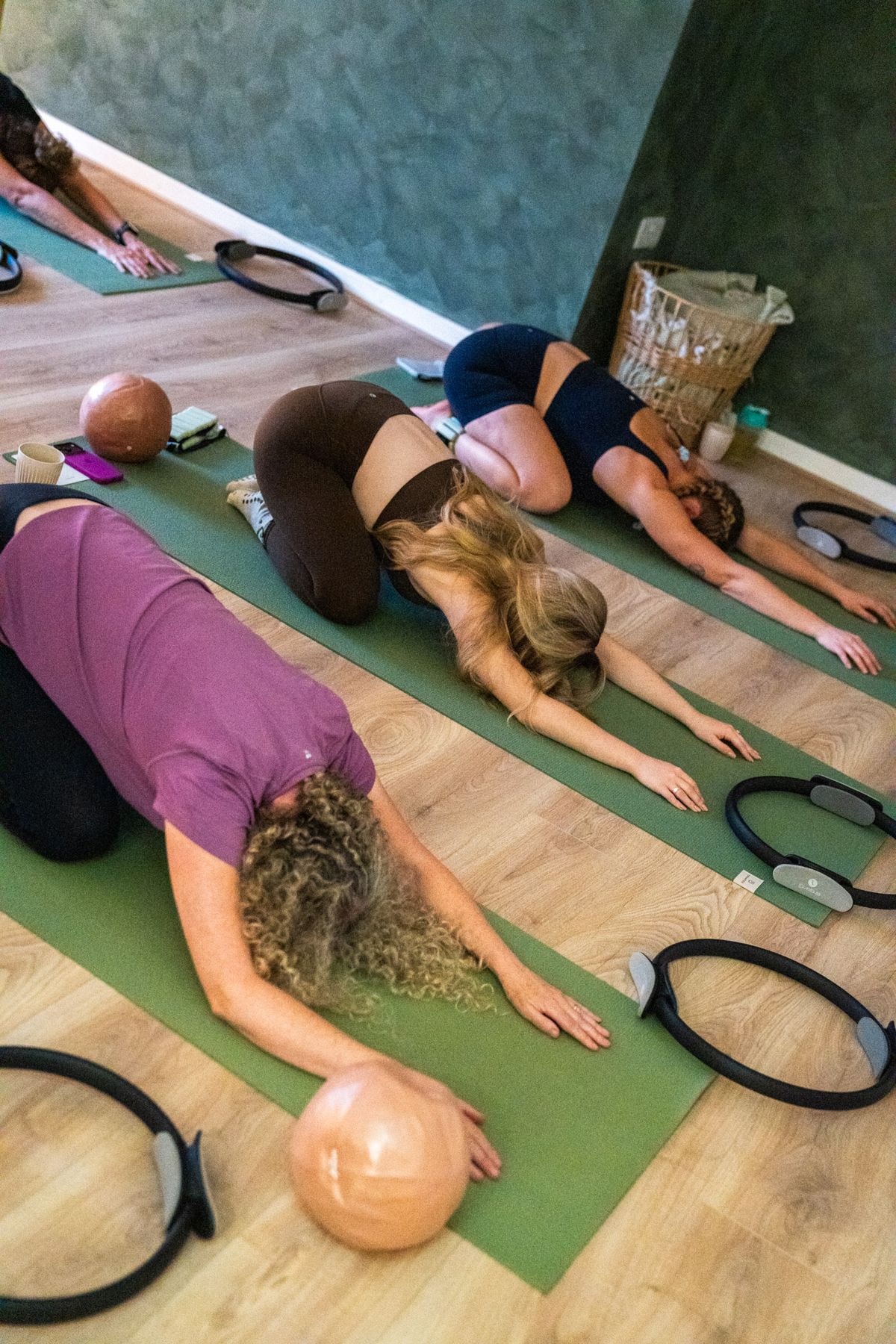 A gentle group stretching practice at Soul & Soma